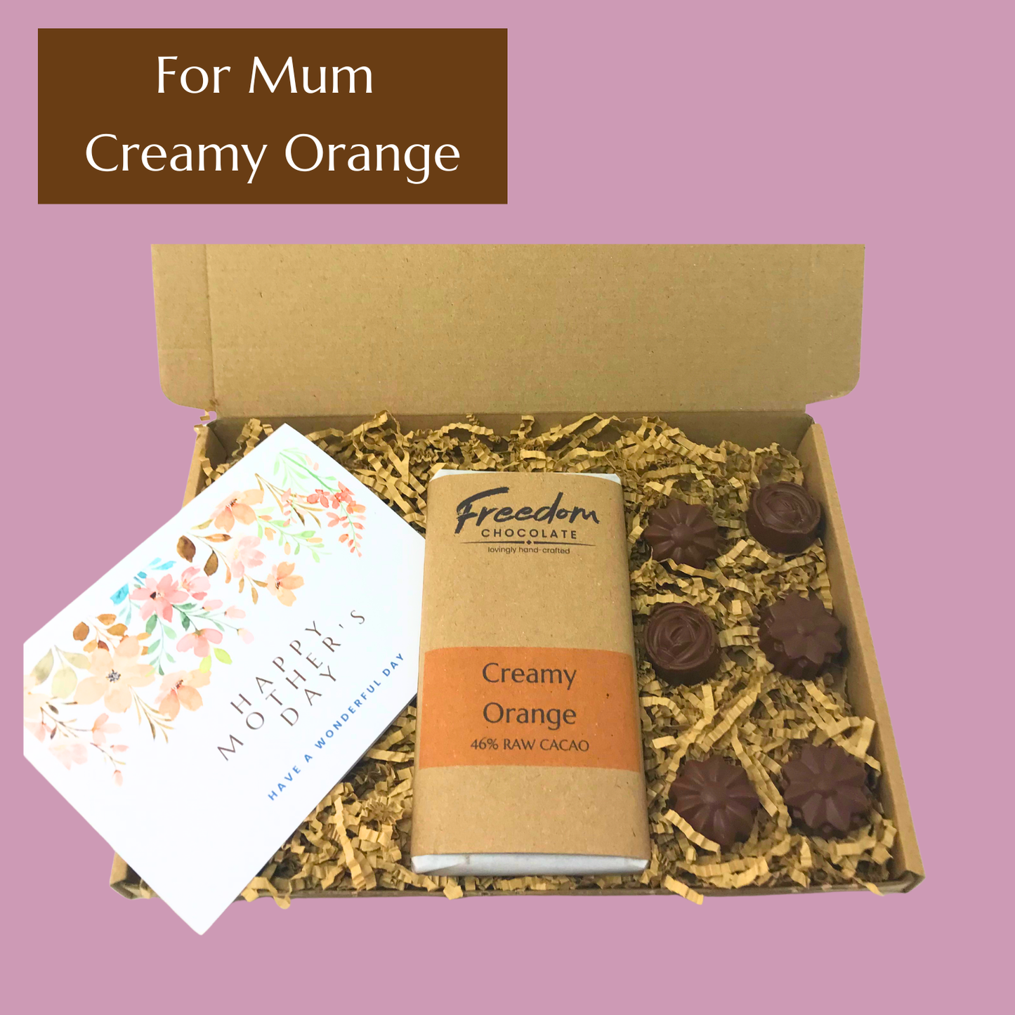 Mother’s Day chocolate gift featuring Creamy Orange artisan chocolate bar, six solid chocolate flowers and handwritten card.