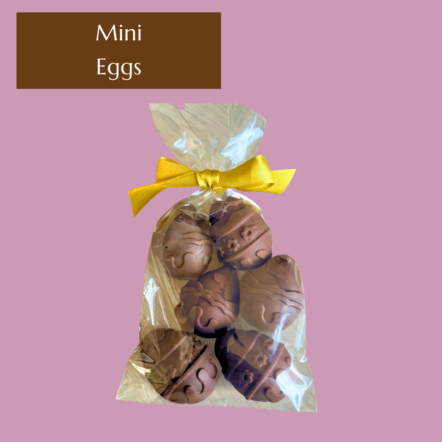 Six Creamy artisan chocolate Easter mini eggs in seasonal gift bag.