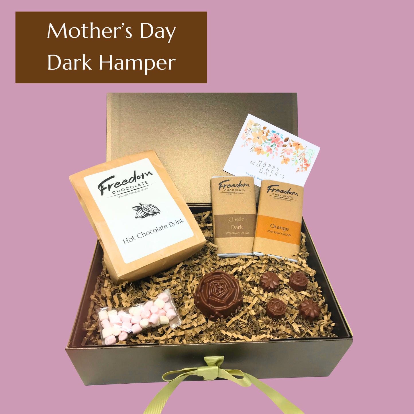 Dark Mother’s Day chocolate hamper featuring Classic Dark and Dark Orange artisan bars, hot chocolate, mallows and solid chocolate flowers in a gorgeous hamper.