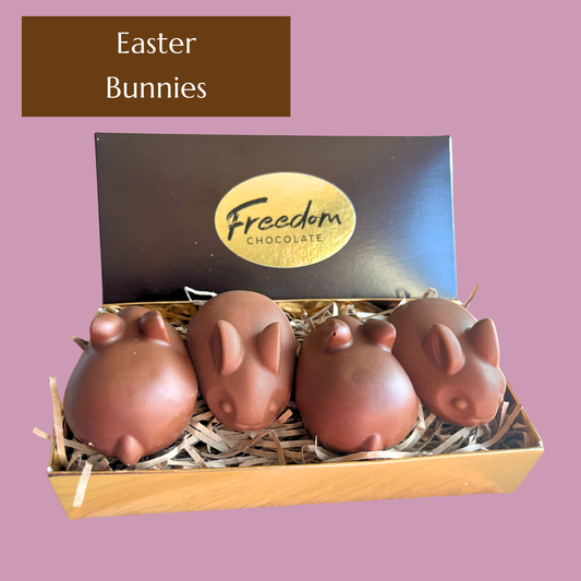 Easter Bunnies gift box featuring four 40g Creamy artisan chocolate bunnies in gift box.