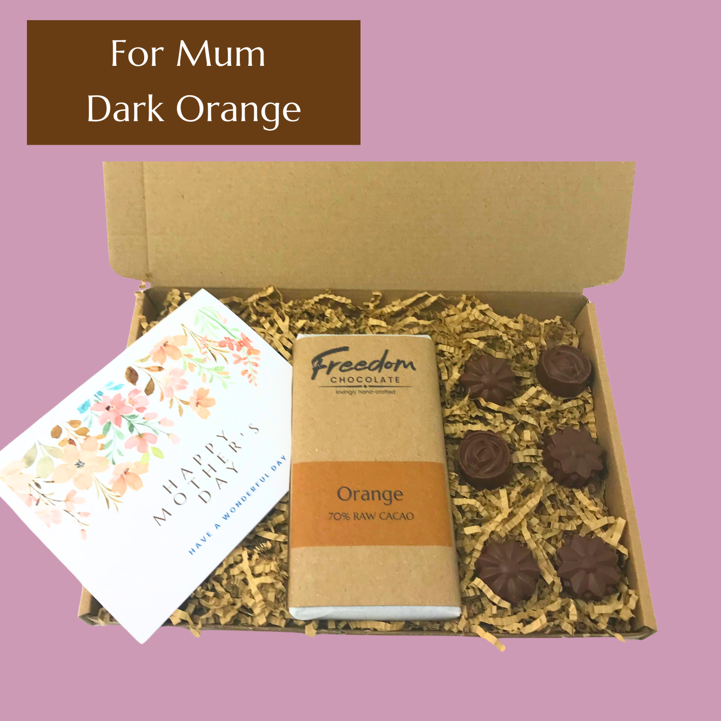 Mother’s Day chocolate gift featuring 70% dark orange cacao bar, six solid chocolate flowers and handwritten card.